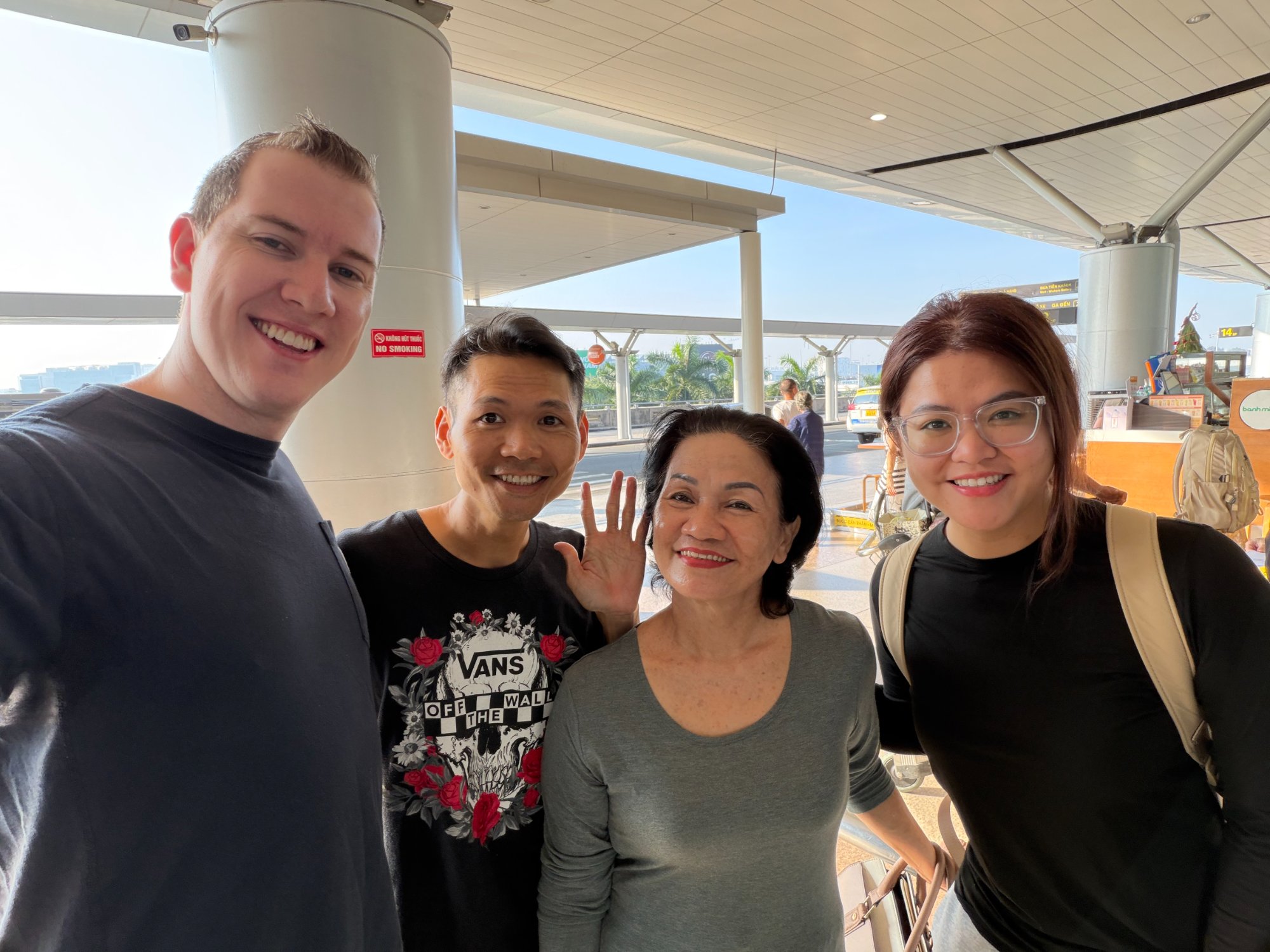 Airport with Nguyên's mother and brother (L→R: Ryan, Hải, mama Hường)